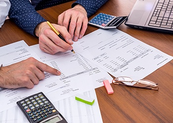 Patient in Midland considering cost of teeth whitening